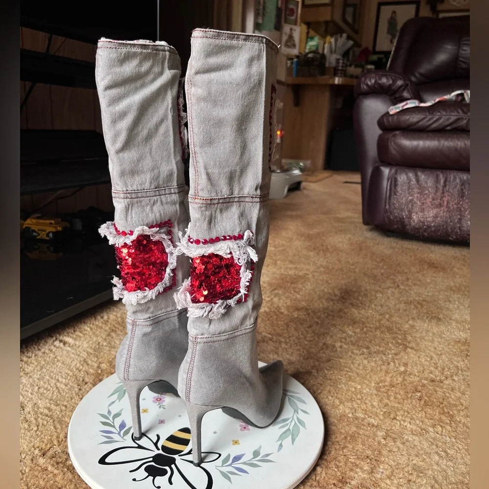 Woman’s multi-color red stone denim pointy toe knee-high boots.